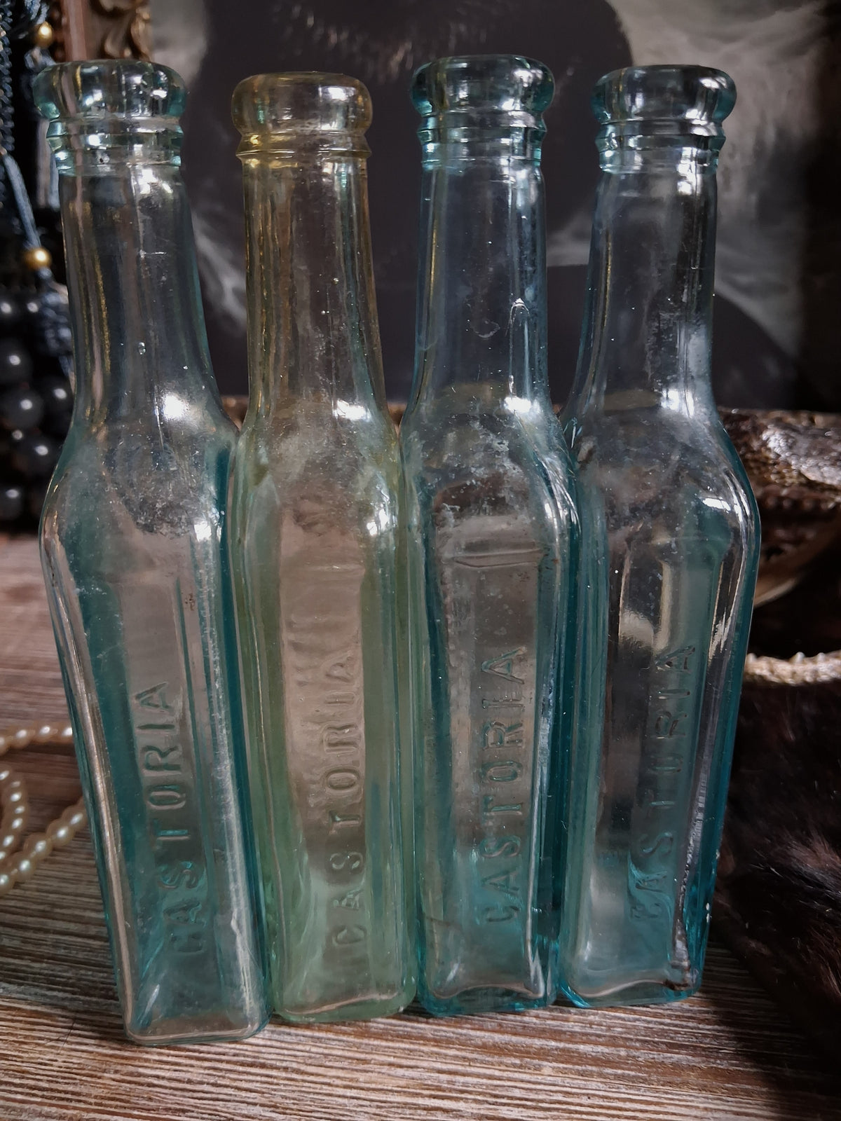 Antique Aqua Glass Castoria Medicine Bottles — Set of 4